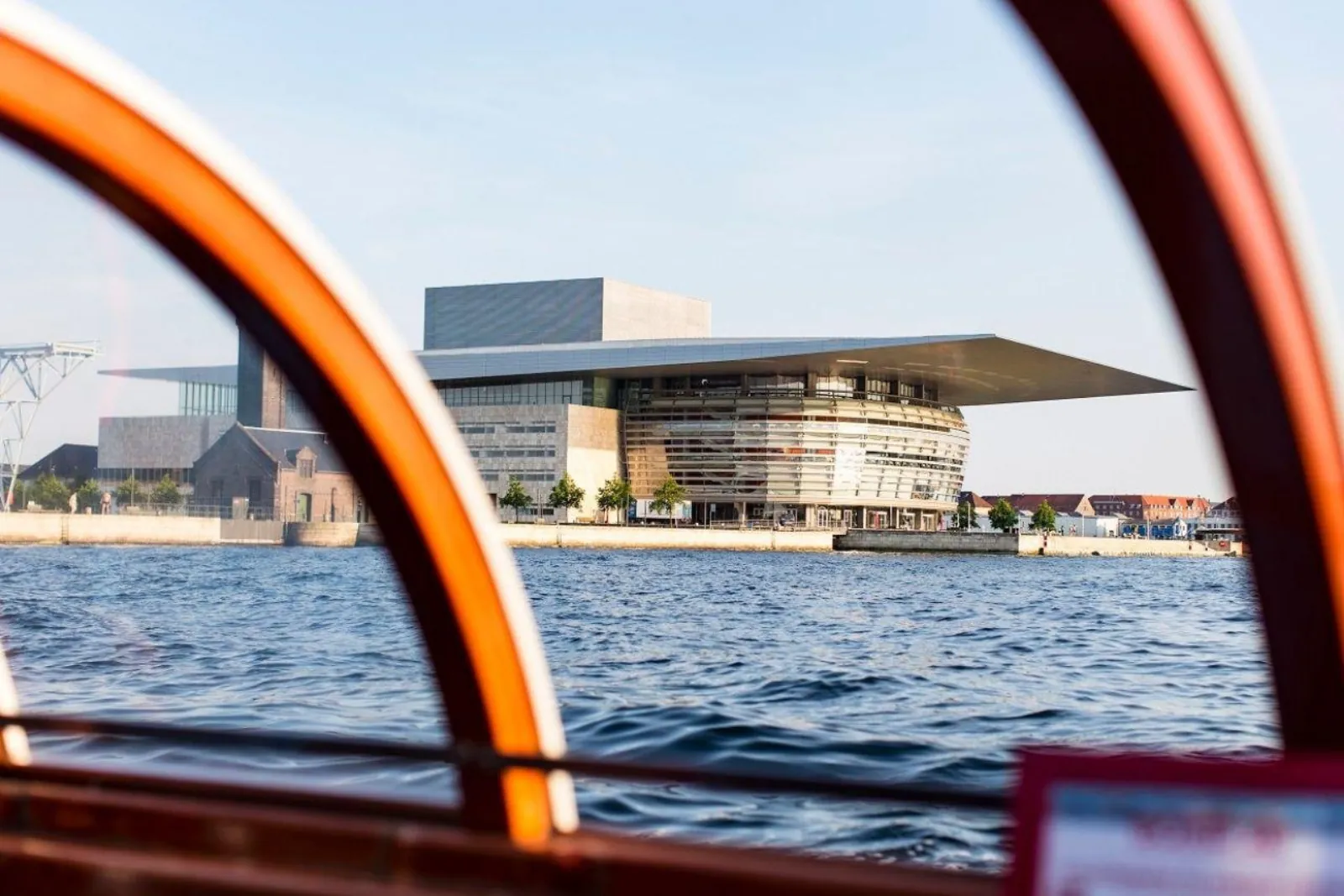 The Opera House seen through the boat's red window frame