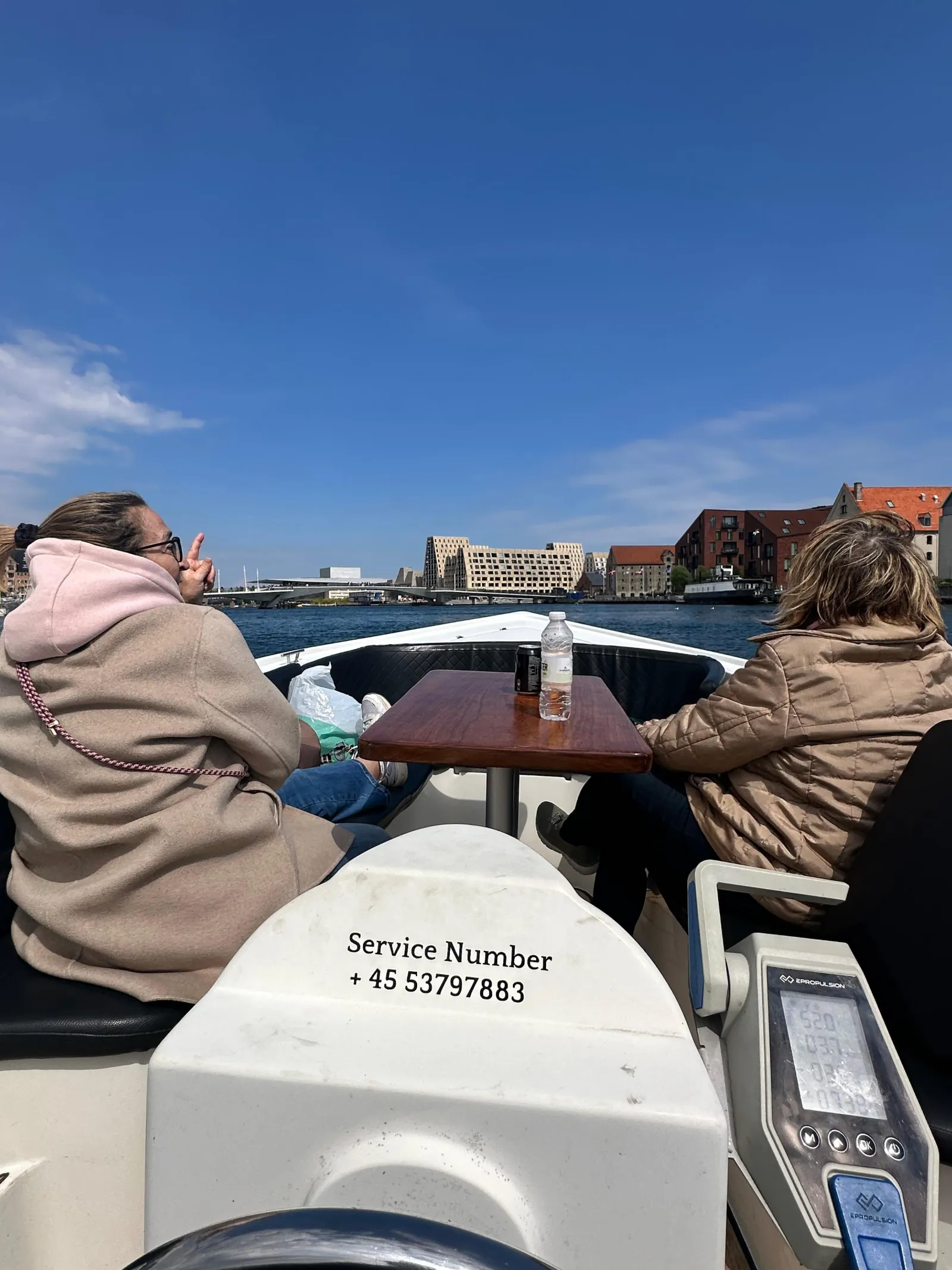A guest at the stern of the boat