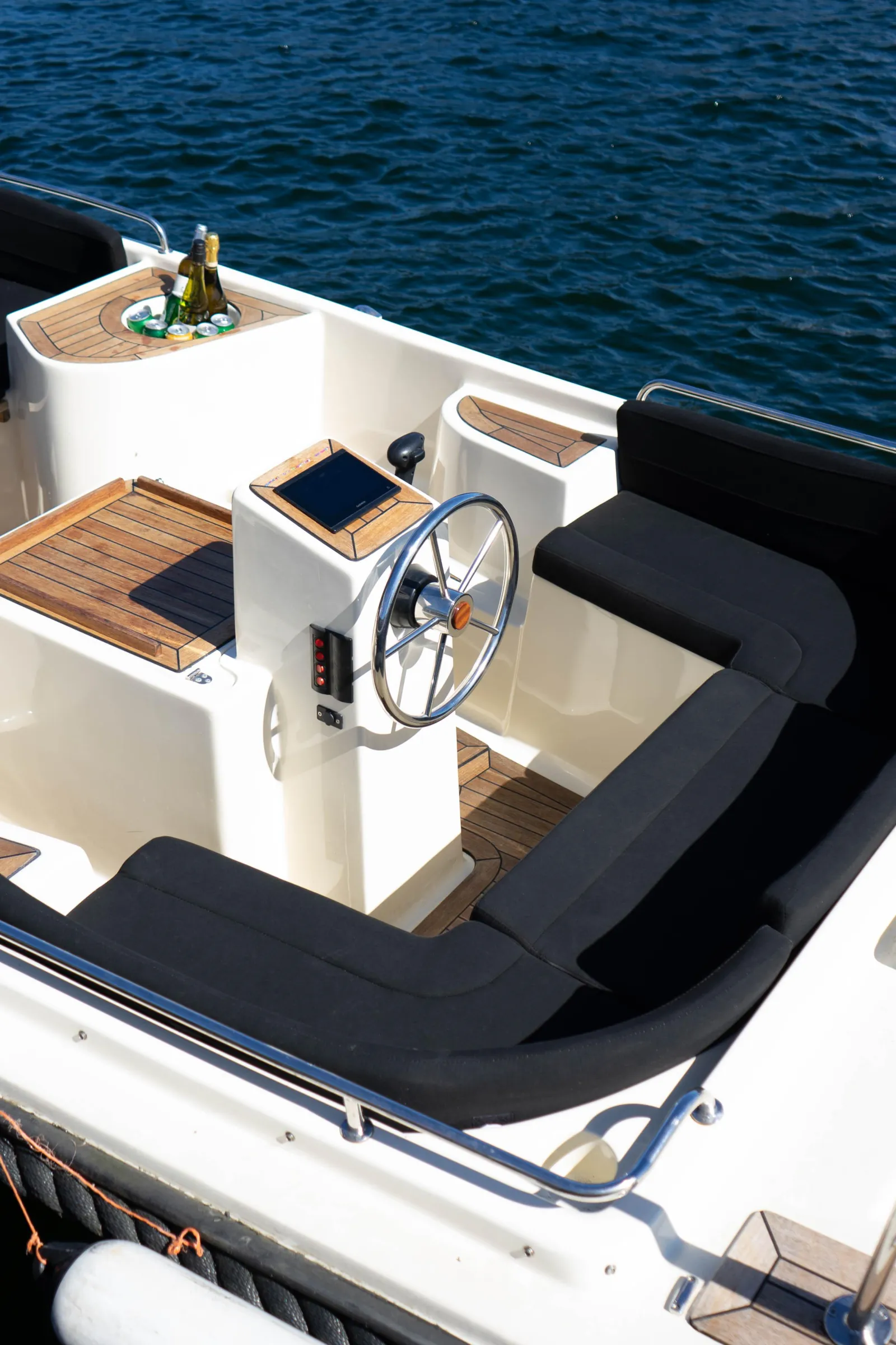 The cockpit and seating of the private boat