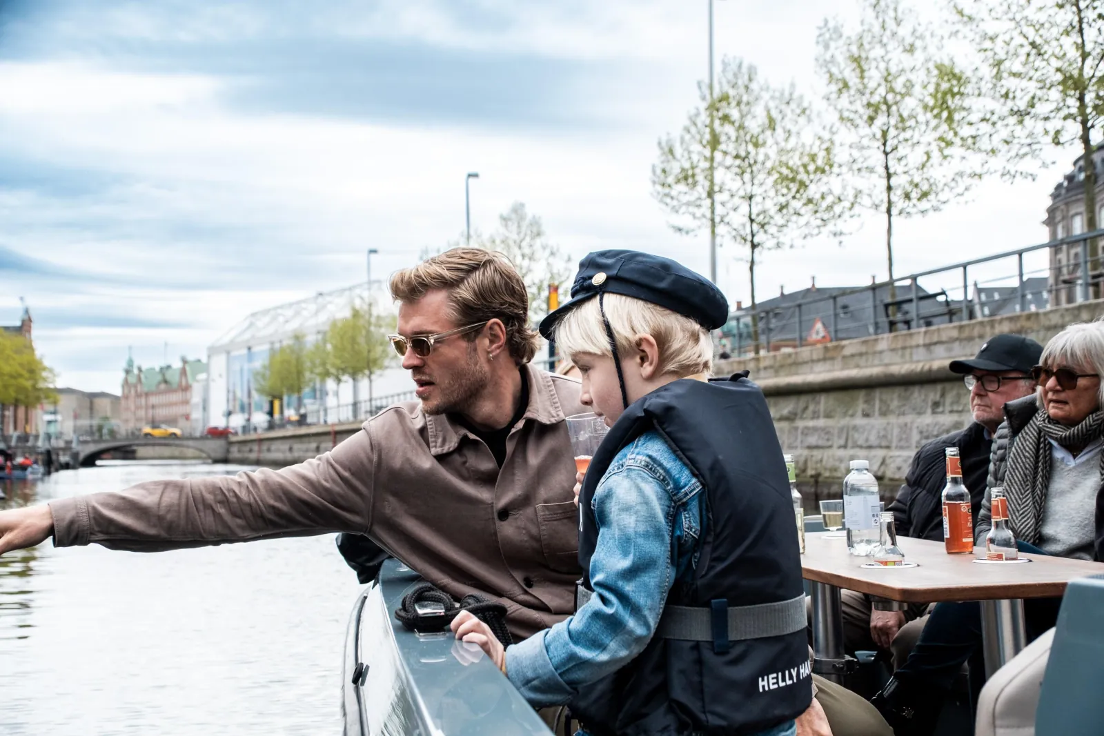 The GoBoat captain pointing out sights to guests